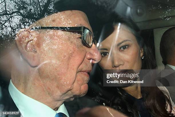 Wendi Deng Murdoch and Rupert Murdoch leave the High Court after Rupert Murdoch gave evidence to the Leveson Inquiry on April 26, 2012 in London,...