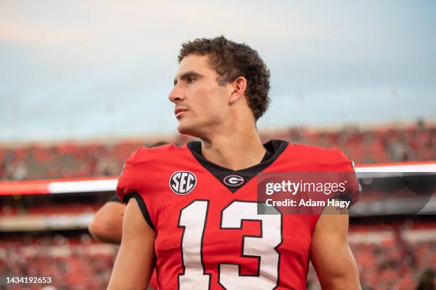 Stetson Bennett of the Georgia Bulldogs looks on after the game against the Vanderbilt Commodores at Sanford Stadium on October 15, 2022 in Athens,...