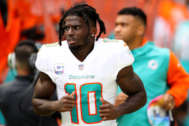 Tyreek Hill of the Miami Dolphins takes the field prior to playing the Minnesota Vikings at Hard Rock Stadium on October 16, 2022 in Miami Gardens,...