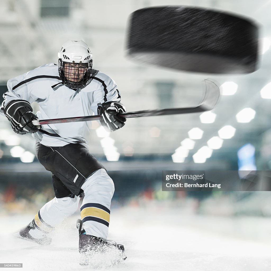 Puck shot by Ice hockey player