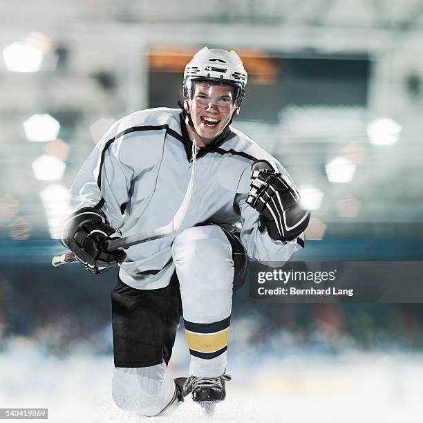 ice hockey player celebrating - hockey player portraits stock pictures, royalty-free photos & images