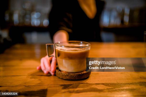cup of cafe latte at the coffee shop - irish coffee cup stock pictures, royalty-free photos & images