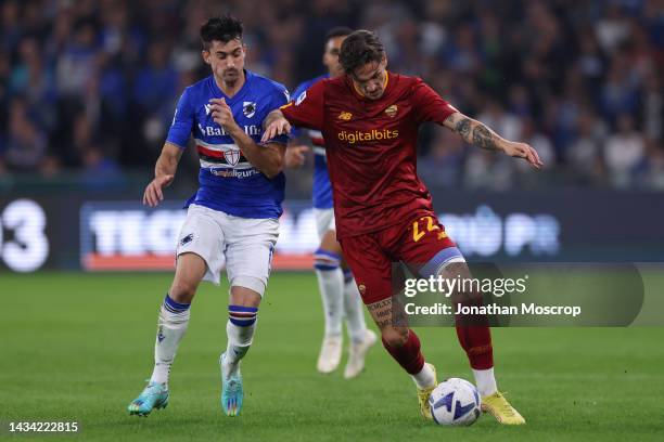 Nicolo Zaniolo of AS Roma takes on Ignacio Pussetto of UC Sampdoria during the Serie A match between UC Sampdoria and AS Roma at Stadio Luigi...