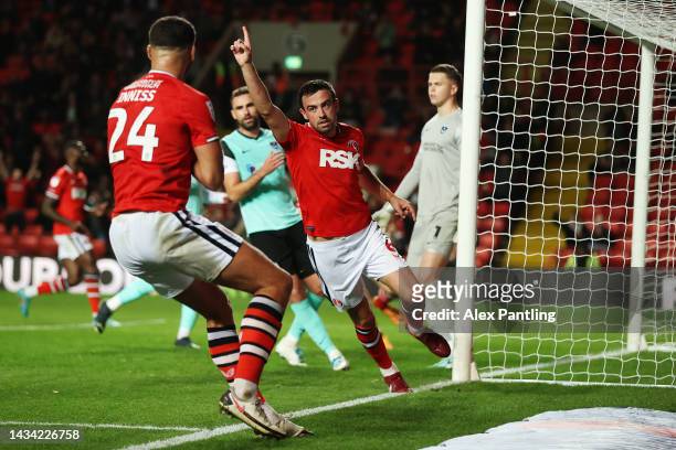 Eoghan O'Connell of Charlton Athletic celebrates scoring their team's third goal during the Sky Bet League One match between Charlton Athletic and...