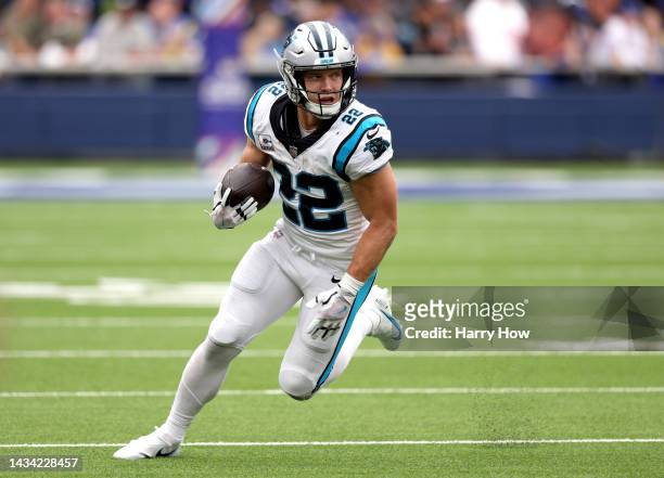 Christian McCaffrey of the Carolina Panthers runs after his catch during a 24-10 loss to the Los Angeles Rams at SoFi Stadium on October 16, 2022 in...