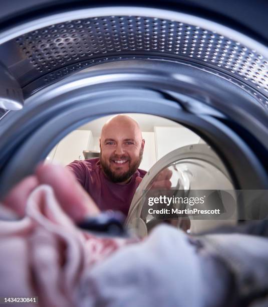 Man Washing Machines Photos and Premium High Res Pictures - Getty Images