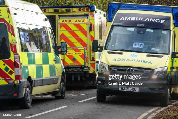 Ambulances queue outside the accident and emergency department of the Bath Royal United Hospital, on October 17, 2022 in Bath, England. The sight of...