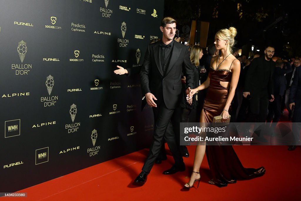 Thibaut Courtois and Mishel Gerzig attend the Ballon D'Or photocall