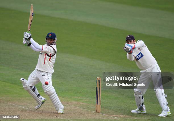 Ashwell Prince of Lancashire plays to the offside as wicketkeeper Craig Kieswetter looks on during day one of the LV County Championship match...