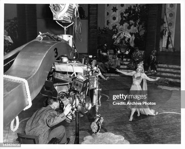 Marilyn Maxwell dancing in front of camera for a scene from the film 'Lost In A Harem', 1944.