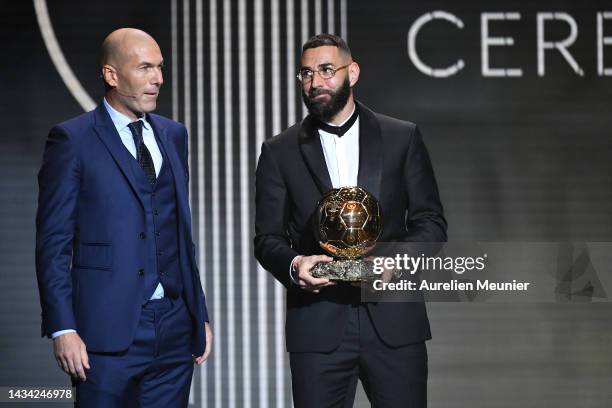 Karim Benzema receives the Ballon d'Or award from Zinedine Zidane during the Ballon D'Or ceremony at Theatre Du Chatelet In Paris on October 17, 2022...