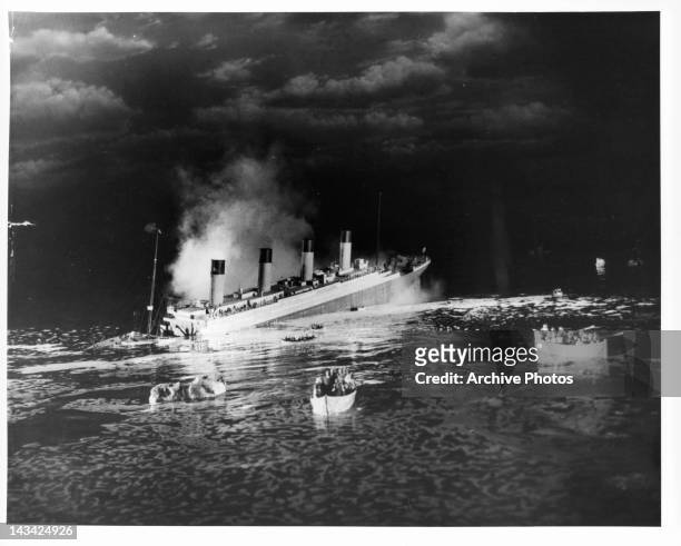 The liner RMS Titanic sinking in a scene from the film 'Titanic', directed by Jean Negulesco, 1953.