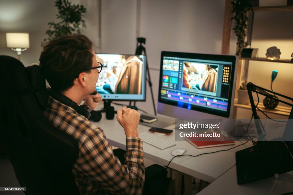 Male video editor working at home