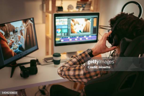 male video editor working at home - editing equipment stock pictures, royalty-free photos & images