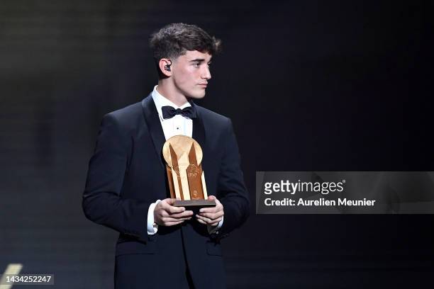 Gavi poses with the Kopa Trophy for best under-21 player during the Ballon D'Or ceremony at Theatre Du Chatelet In Paris on October 17, 2022 in...