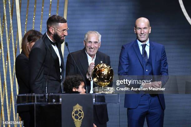 Karim Benzema receives the Ballon d'Or award from Zinedine Zidane next to his mother Malika Benzema, his son Ibrahim and his father Hafid Benzema...