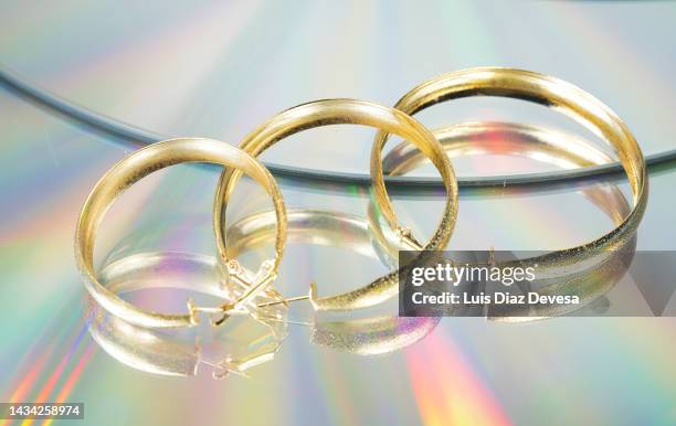 reflection of  earrings - jewellery background stock pictures, royalty-free photos & images