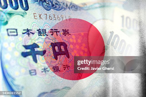 Japan flag and Japanese Yen cash bills Japan flag and Japanese Yen cash bills