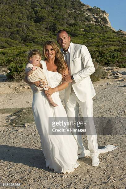 Charlotte-Sophie Zenden ,John Heitinga pose at their wedding on July 15, 2010 in Ibiza, Spain.