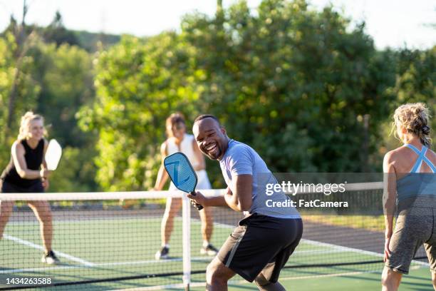 playing pickleball - sports team spirit stock pictures, royalty-free photos & images