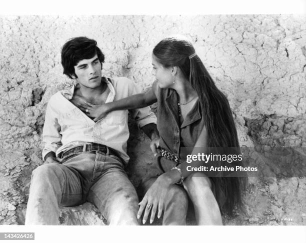 Mark Frechette's chest is touched by Daria Halprin in a scene from the film 'Zabriskie Point', 1970.