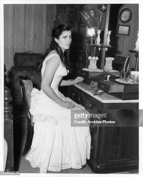 Irene Papas in dressing room in between scenes from the film 'Tribute To A Bad Man', 1956.