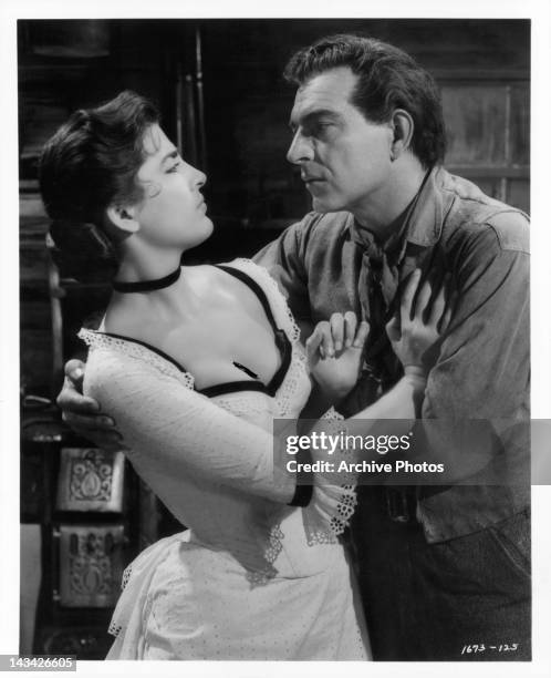 Irene Papas resisting Stephen McNally in a scene from the film 'Tribute To A Bad Man', 1956.