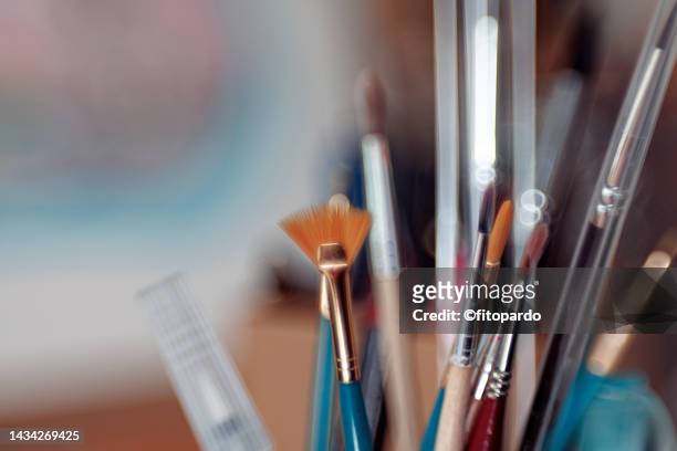 close-up of multiple paintbrushes shot on a macro lens - fitopardo stock pictures, royalty-free photos & images