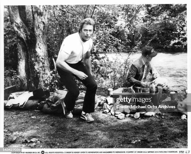Clint Eastwood and Geoffrey Lewis at a campfire site in a scene from the film 'Any Which Way But Loose', 1978.