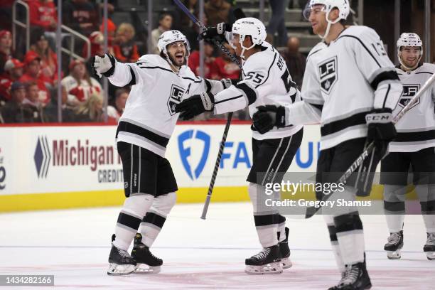 Phillip Danault of the Los Angeles Kings celebrates his game winning overtime goal with teammates to beat the Detroit Red Wings 5-4 at Little Caesars...