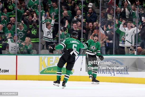 Jani Hakanpaa of the Dallas Stars celebrates with Nils Lundkvist of the Dallas Stars after scoring a goal against the Winnipeg Jets in the second...