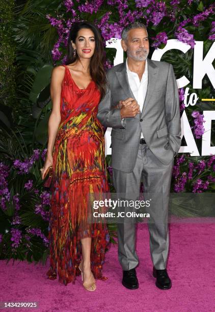 Amal Clooney and George Clooney attend the premiere of Universal Pictures' "Ticket To Paradise" at Regency Village Theatre on October 17, 2022 in Los...