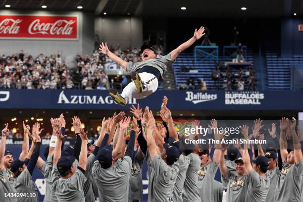 Head coach Satoshi Nakajima of Orix Buffaloes is tossed into the air after his team's victory against Fukuoka SoftBank Hawks in the Pacific League...