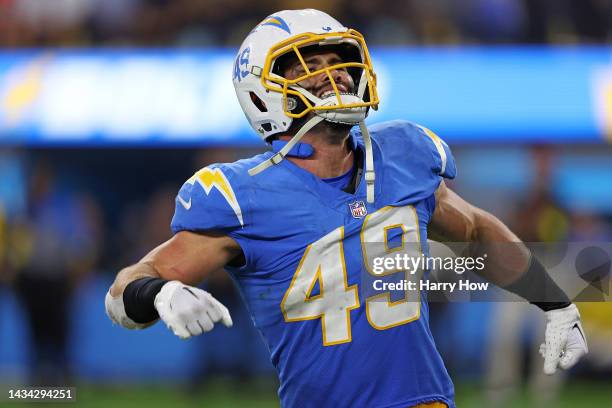 Drue Tranquill of the Los Angeles Chargers celebrates after sacking Russell Wilson of the Denver Broncos during the fourth quarter at SoFi Stadium on...