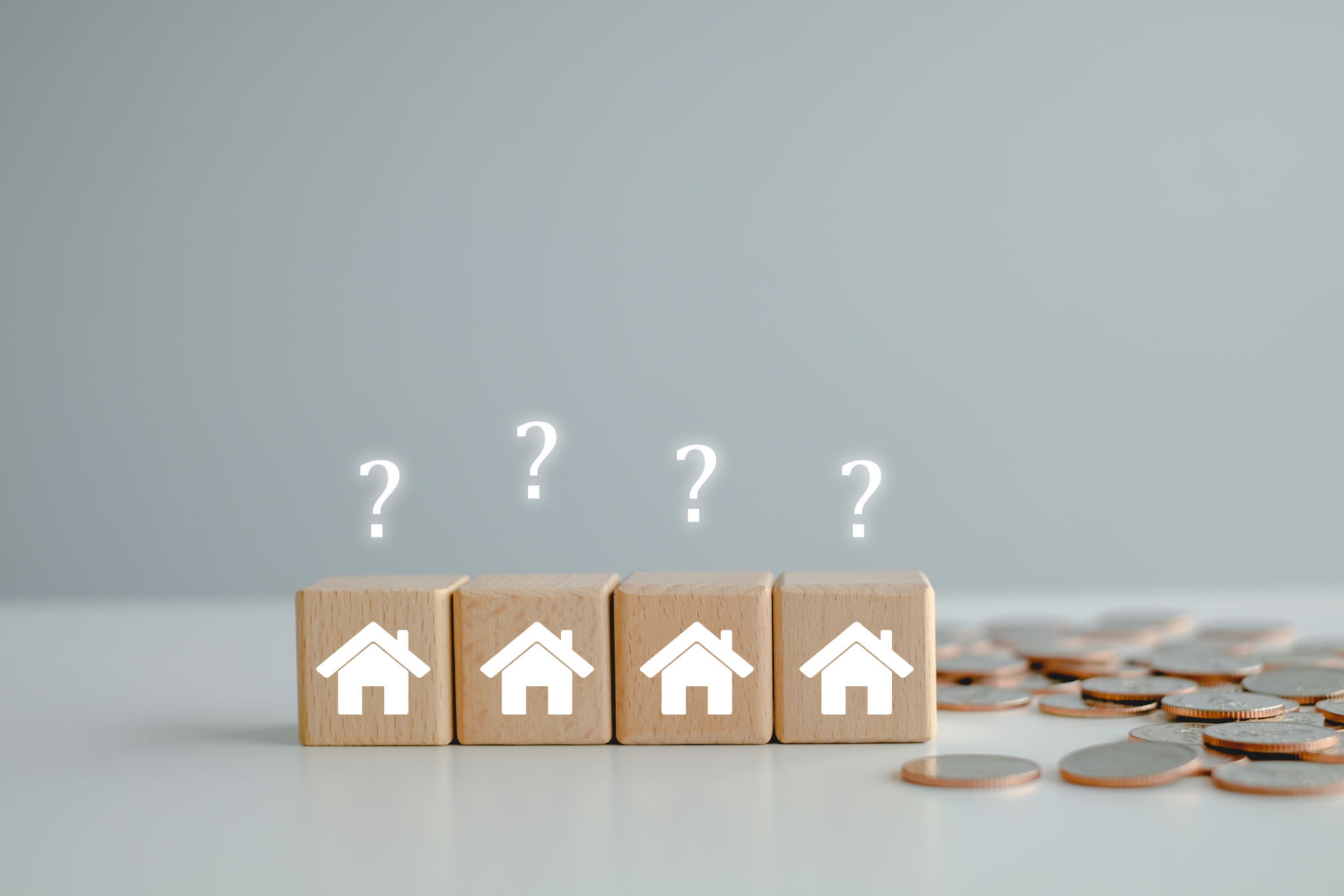 Real estate, Property investment and asset management concept. House on wooden block with question mark and money coin. Decision to choose the best property with your right. Choosing suitable housing. Real estate, Property investment and asset management concept. House on wooden block with question mark and money coin. Decision to choose the best property with your right. Choosing suitable housing.