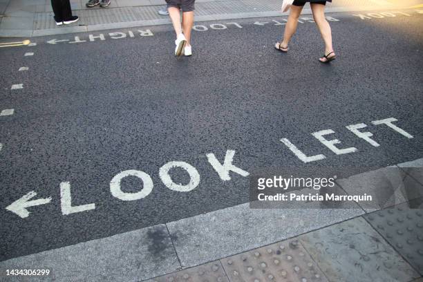 “look left” in london - chevron stock pictures, royalty-free photos & images