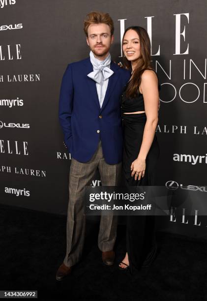Finneas and Claudia Sulewski attend the 29th Annual ELLE Women in Hollywood Celebration on October 17, 2022 in Los Angeles, California.