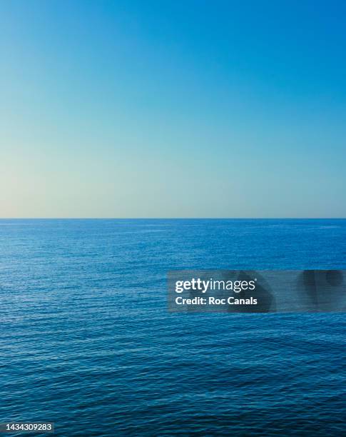 rippled sea against clear sky - oceaan stockfoto's en -beelden