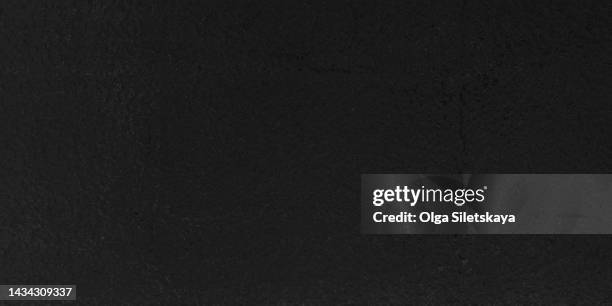 black abstract textured background - film grain stock pictures, royalty-free photos & images