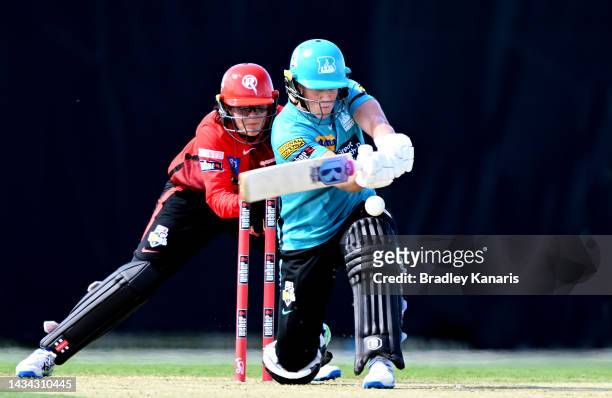 Grace Harris of the Heat plays a shot during the Women's Big Bash League match between the Brisbane Heat and the Melbourne Renegades at Great Barrier...