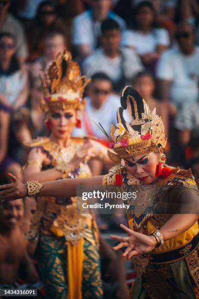 kecak fire dance at uluwatu temple, bali, indonesia - bali dancing stock pictures, royalty-free photos & images