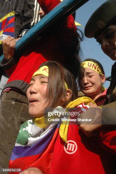 Tibetan exile groups stage a spirited anti-Chinese demonstration at the gates of the Chinese Embassy in New Delhi.