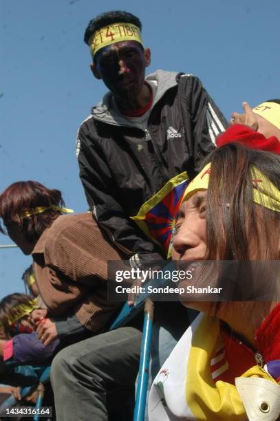 Tibetan exile groups stage a spirited anti-Chinese demonstration at the gates of the Chinese Embassy in New Delhi.