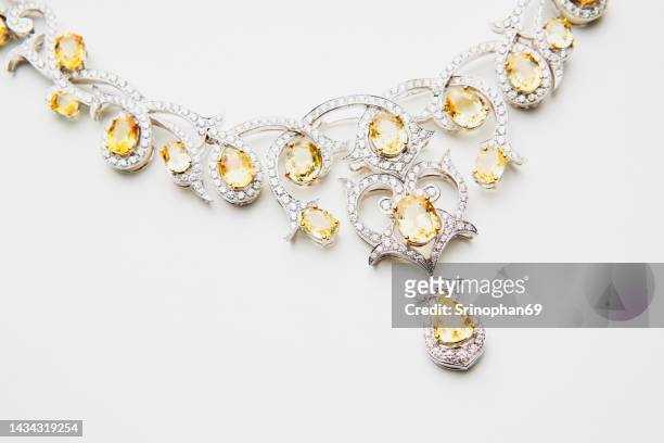 beautiful fashion gold and silver jewelry and realistic accessories isolated on white background. - diamond necklace stock pictures, royalty-free photos & images