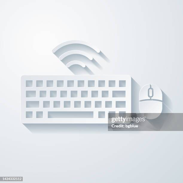 wireless keyboard and mouse. icon with paper cut effect on blank background - press button icon stock illustrations