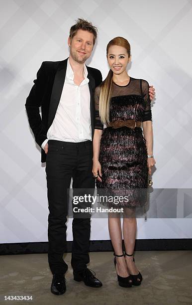 In this photo provided by Burberry, Christopher Bailey and Jolin Tsai attend the opening of the Burberry 101 Flagship Store on April 26, 2012 in...