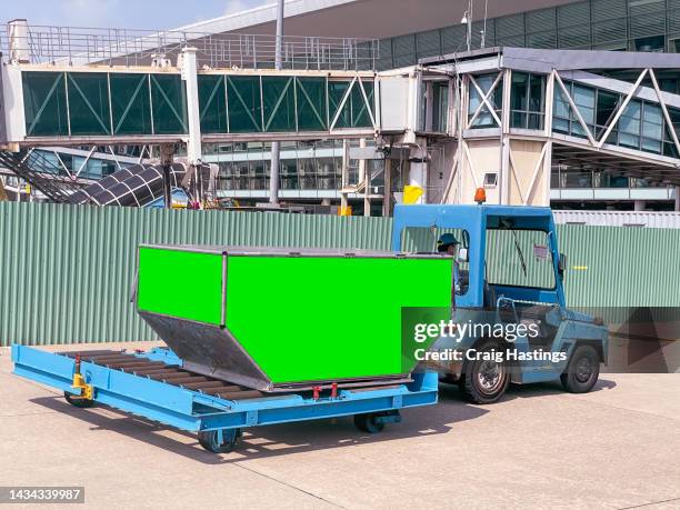 international air cargo freight truck with single pod with greens screen chroma keys sections allowing green screen to be replaced with marketing or ad agencies campaign content for images or video. aviation flight cargo trade concept - luggage hold stock pictures, royalty-free photos & images