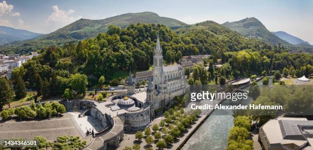 our lady of lourdes rosary basilica in lourdes drone panorama france - our lady of lourdes stock pictures, royalty-free photos & images