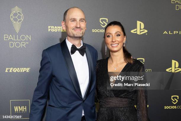 Jean-Etienne Amaury and a guest attend the Ballon d'Or photocall at Theatre Du Chatelet In Paris on October 17, 2022 in Paris, France.