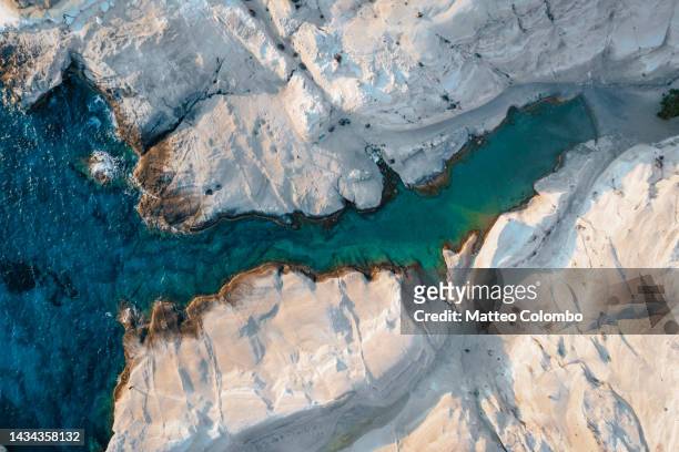 aerial view of famous white rocks, sarakiniko, milos, greece - chalk rock stock pictures, royalty-free photos & images